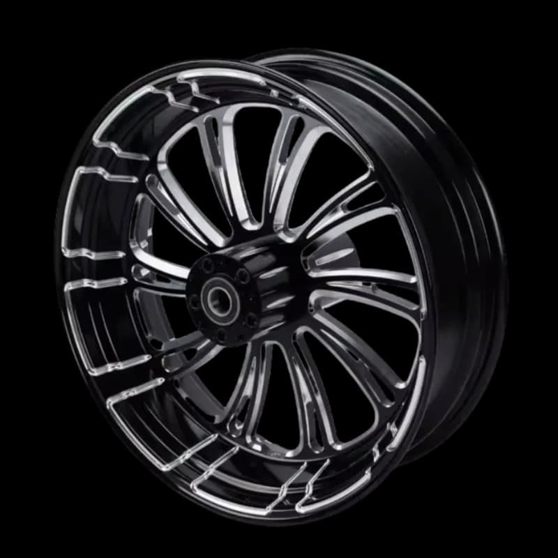 Luxury forged Harley wheel with twisted spoke pattern and gloss black with machined face finish