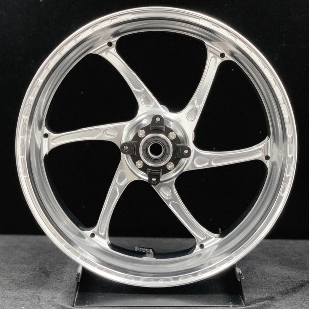 Forged aluminum rear wheel for TRIUMPH 765RS in polished finish with black hub and 6-spoke layout
