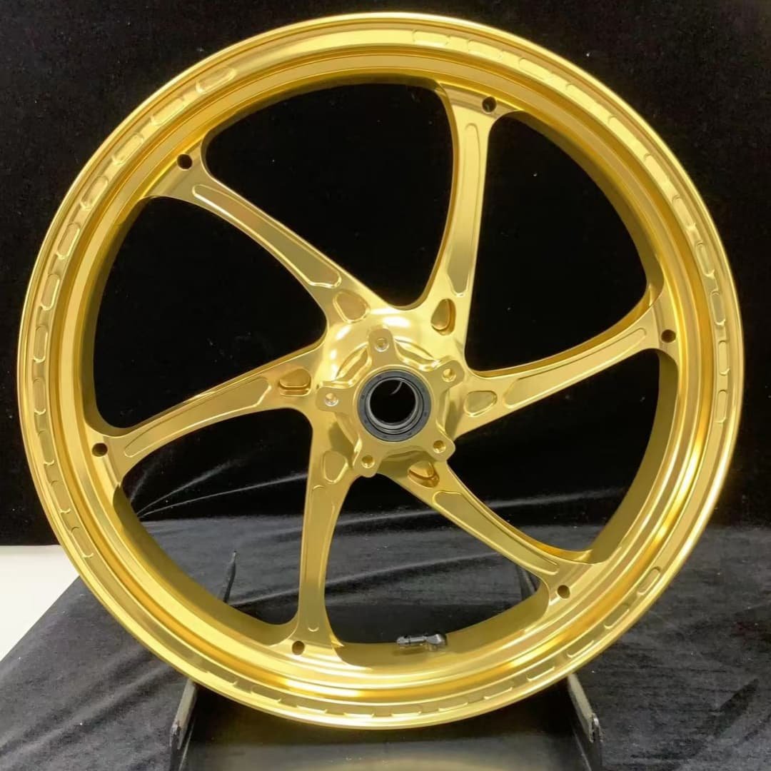Forged front wheel for KTM 790 / 890 with gold anodized finish and precision 6-spoke design