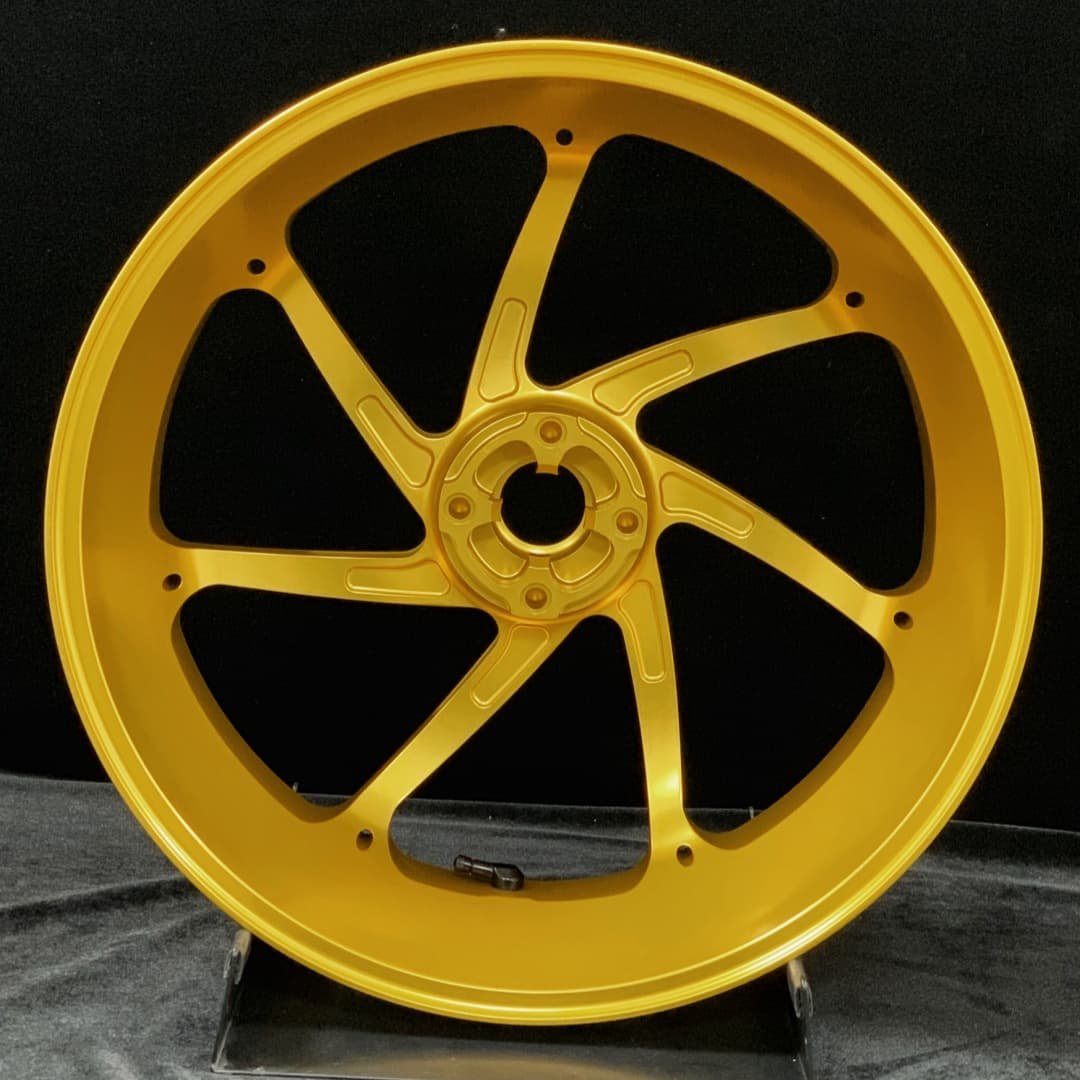 Custom forged aluminum wheel for Ducati HYPERMOTARD – 7-spoke lightweight racing design in anodized gold