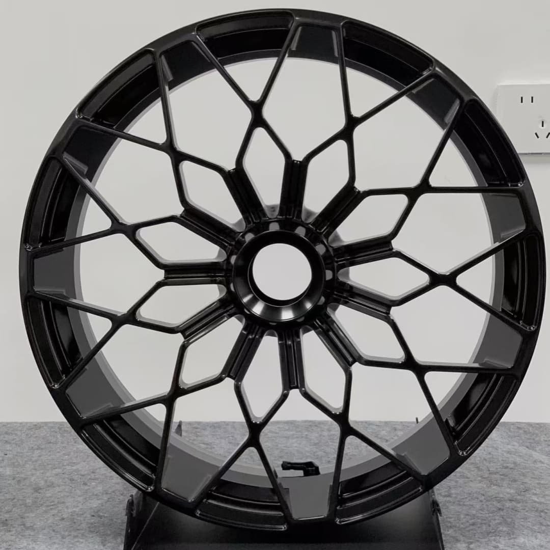 Forged front wheel for Ducati MULTISTRADA V4 – black radial mesh-spoke design for high-performance adventure bikes