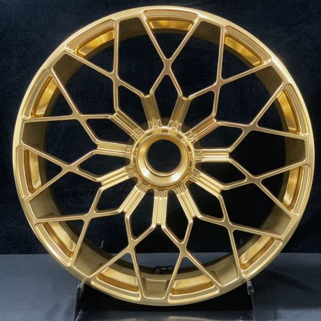 Gold forged rear wheel for MV Agusta bikes with aggressive multi-spoke mesh pattern
