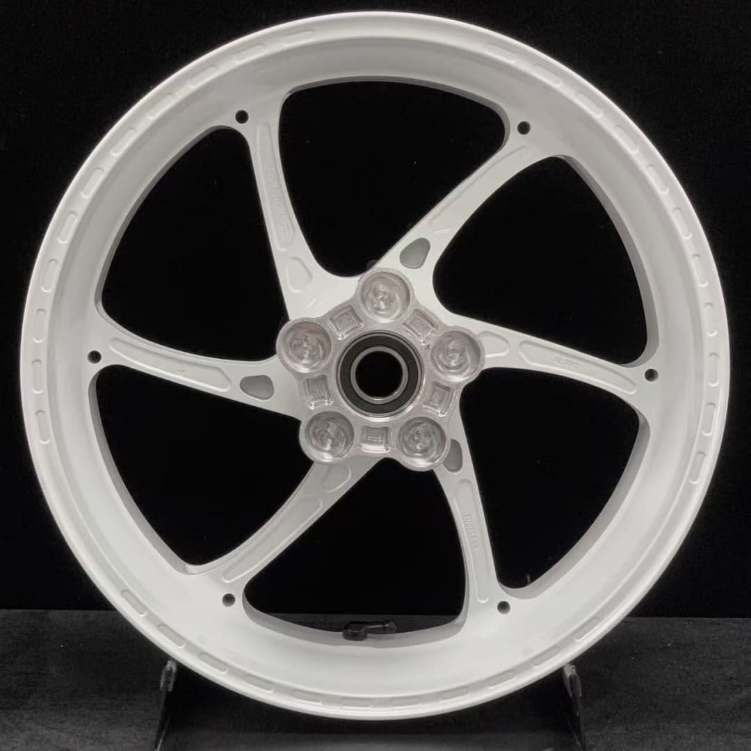 White forged rear wheel for Yamaha R6 motorcycle with aerodynamic 6-spoke sport design