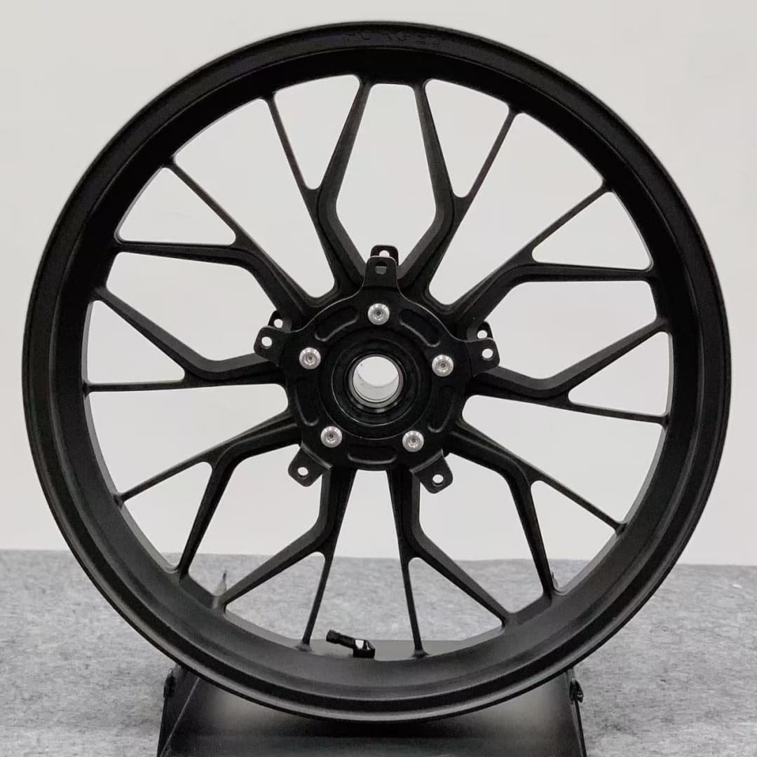 Black forged front wheel for BMW S1000RR sportbike with Y-style racing spoke design