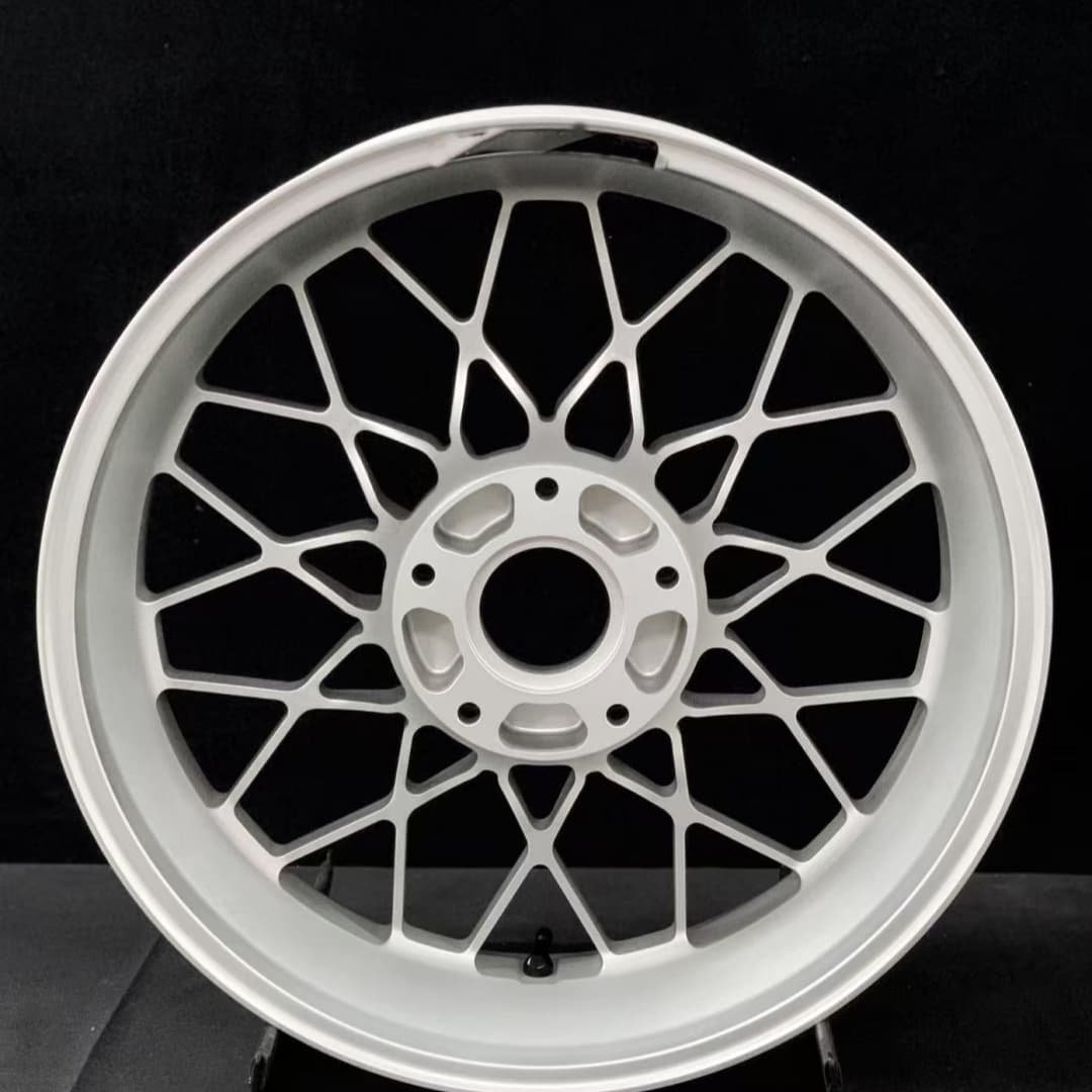 Forged motorcycle wheel for BMW R nineT in brushed silver with vintage mesh spoke design