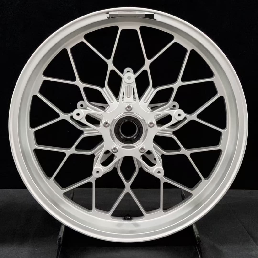 Custom forged rear wheel for BMW R nineT with exposed hub and cross-mesh CNC machining