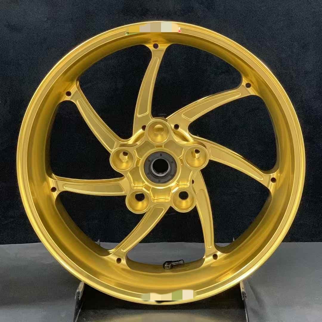 Rear forged motorcycle wheel in gold finish for Aprilia RSV4 with multi-point hub design