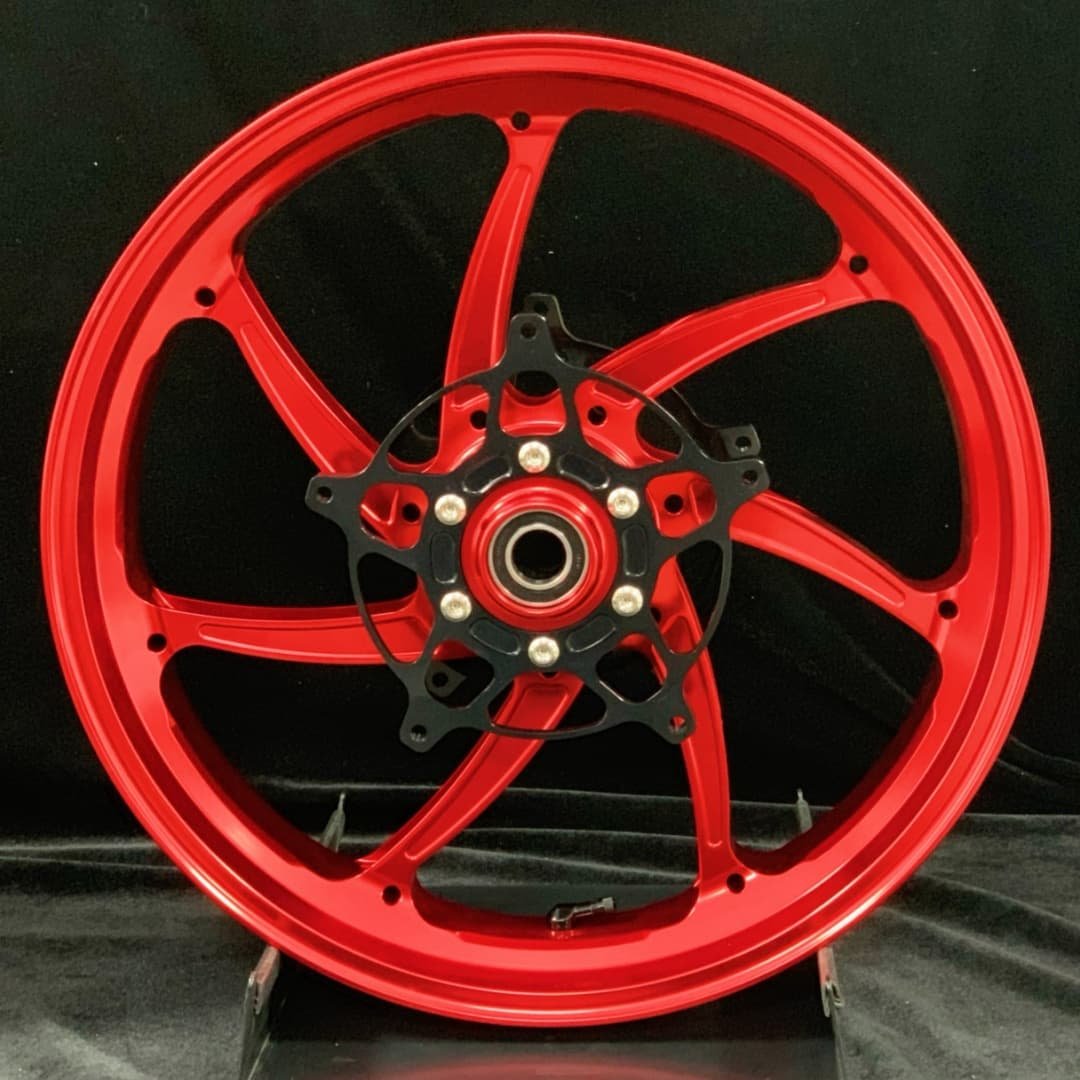 Red forged motorcycle front wheel for BMW S1000RR with black hub and aggressive racing design