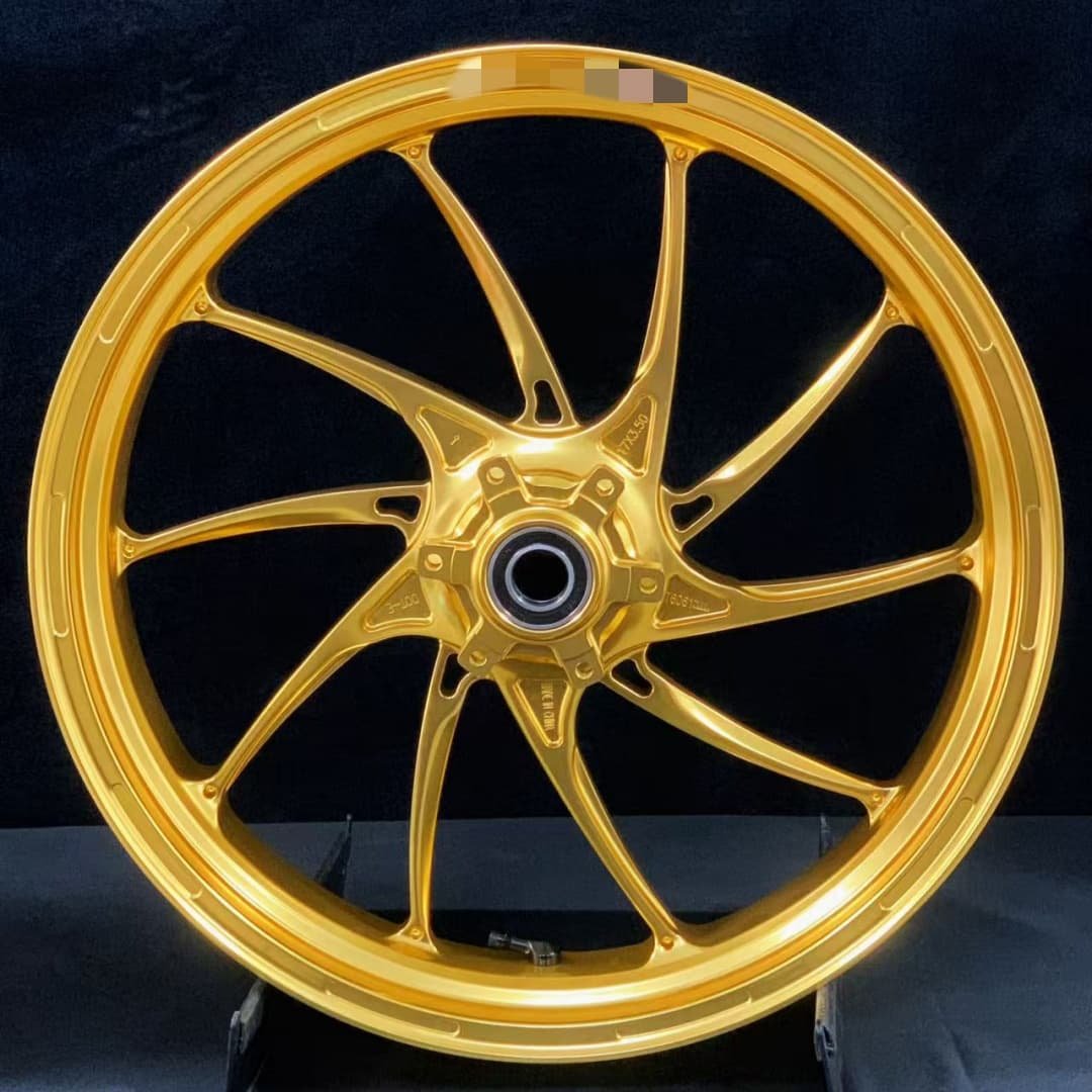 Forged front motorcycle wheel for BMW S1000RR or R1250RT in gold with CNC cut-outs for reduced weight