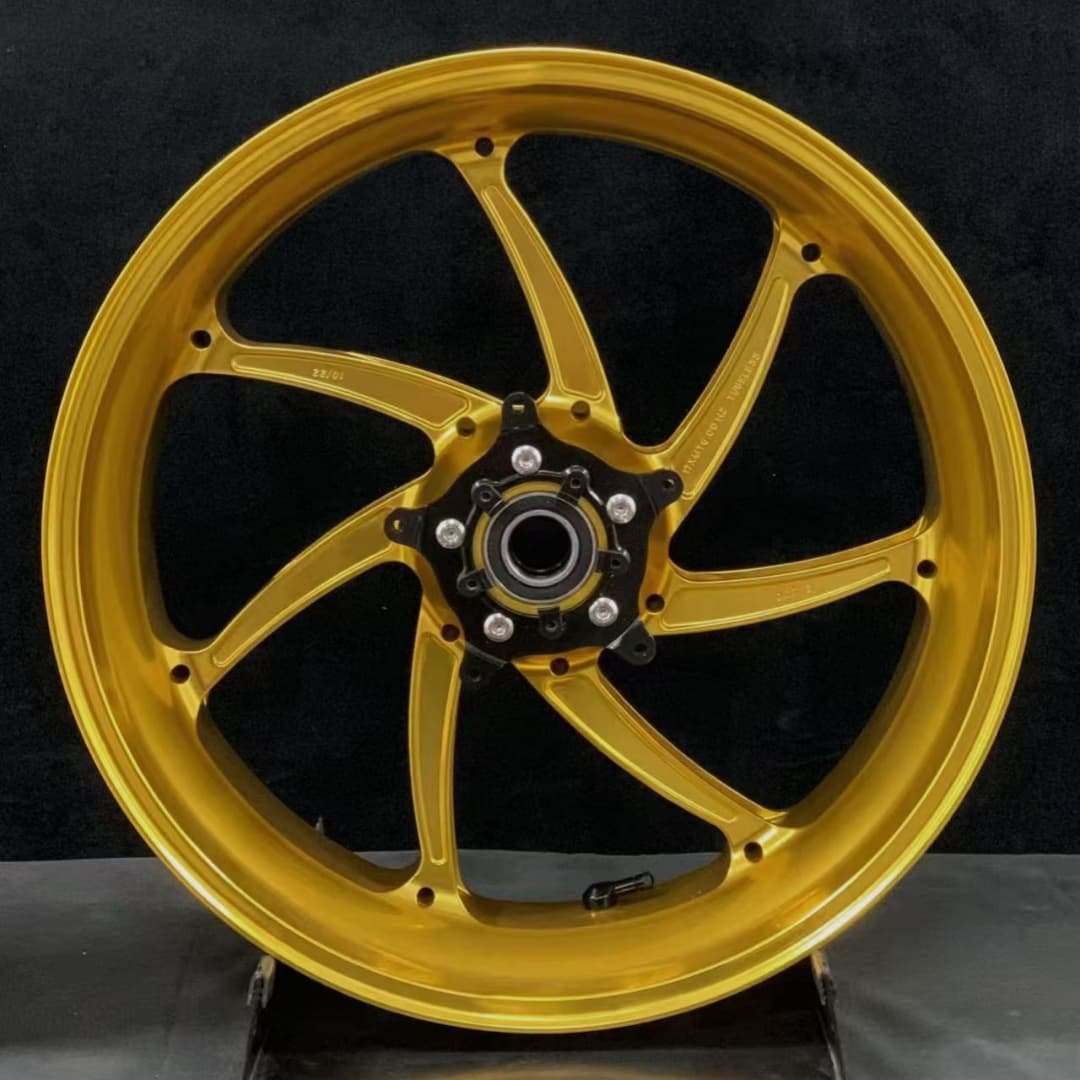 Gold forged motorcycle wheel for BMW R nineT or R1250RT with classic 7-spoke symmetric design