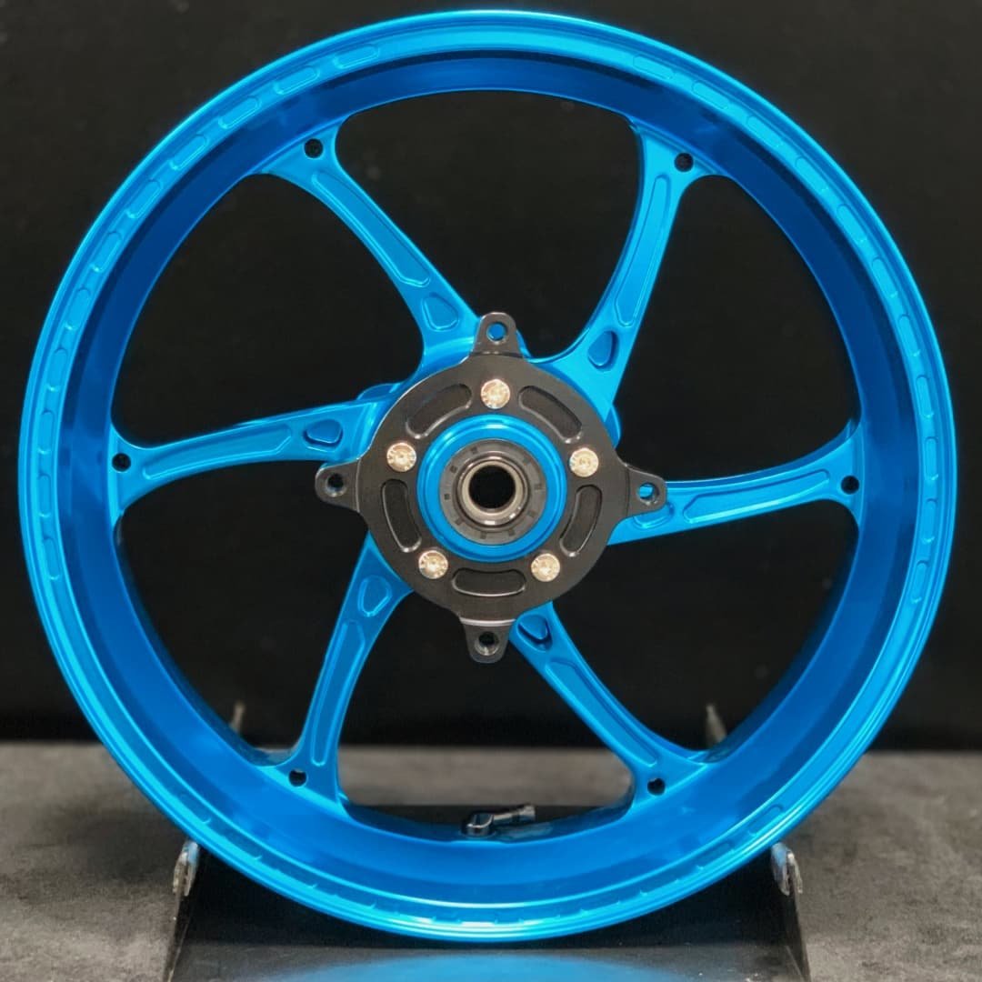 Forged rear wheel for HONDA X-ADV750 – lightweight 5-spoke aluminum alloy in anodized blue with hub assembly
