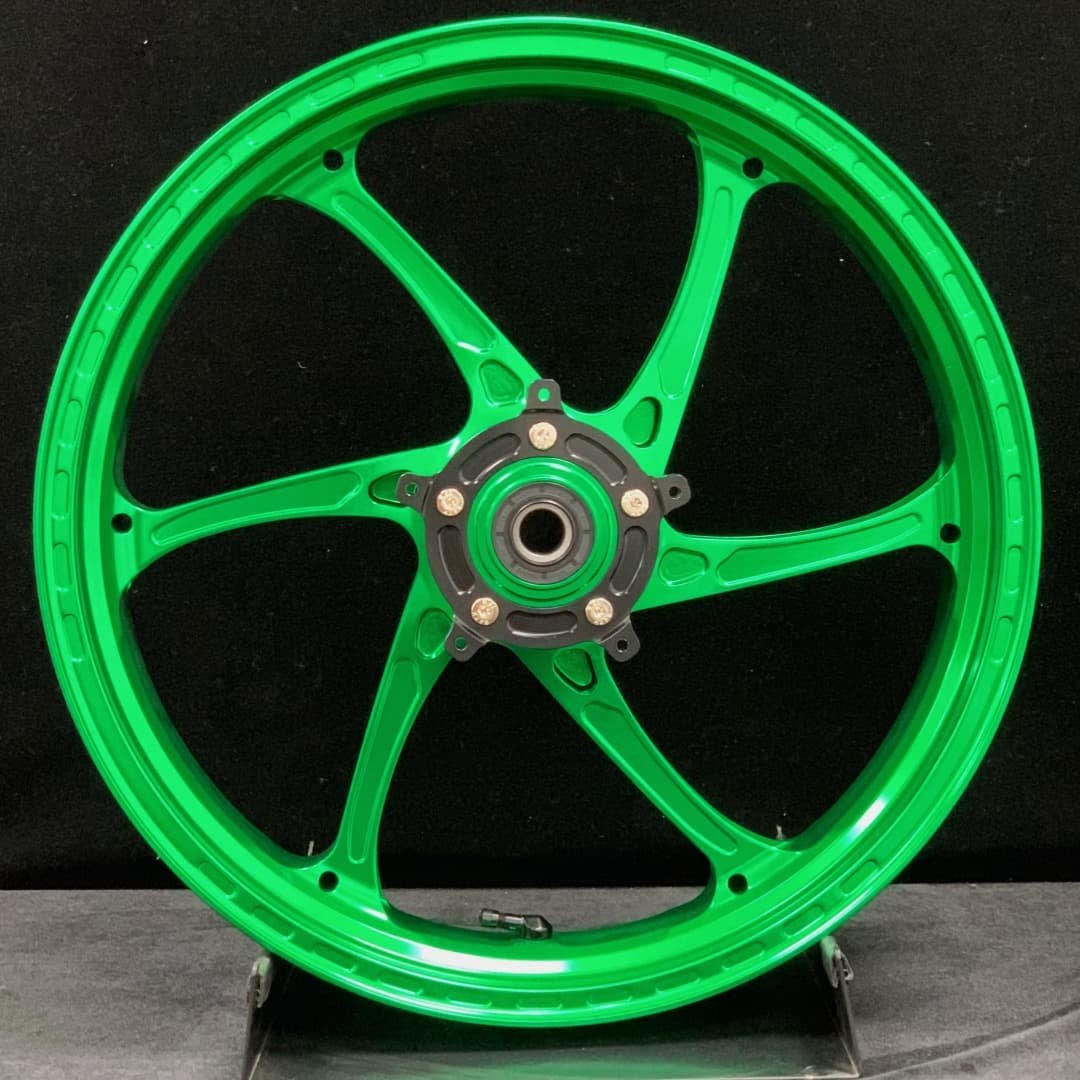 Forged rear wheel for HONDA X-ADV750 – anodized green finish with 5-spoke design and black hub for high-load touring