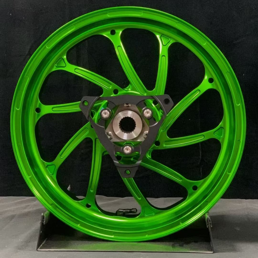 Forged rear wheel for Yamaha XMAX with unique green 10-spoke design and CNC machined hub