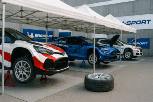 Forged rally wheels on display in a French rally service area