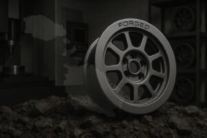 Forged rally wheel on terrain with Malta map overlay