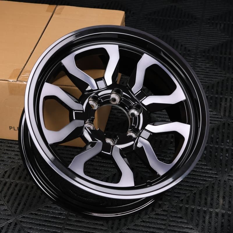 Forged off-road wheel with desert gold finish and matte black beadlock ring for sand and overland builds