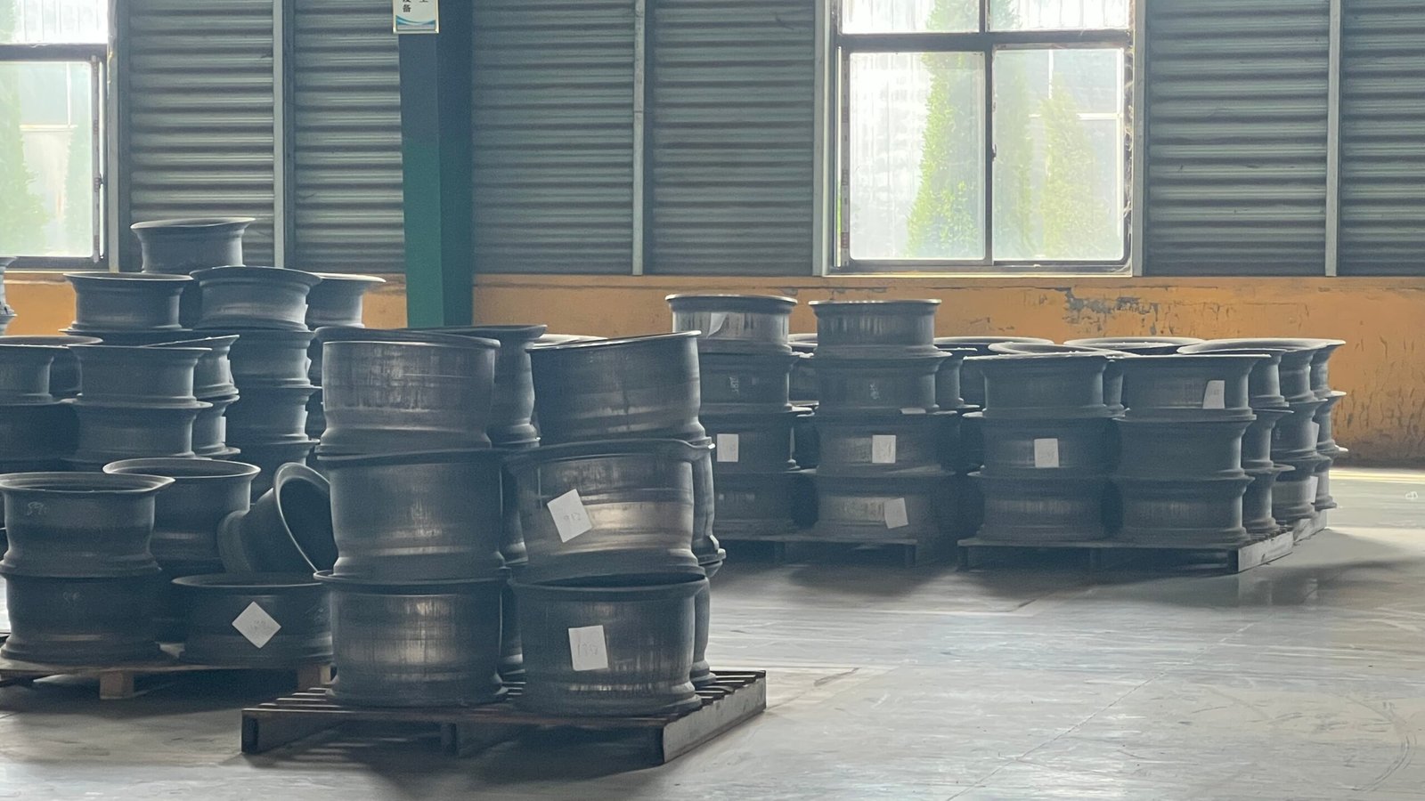 AZ80 forged magnesium wheel blanks stored indoors at FLEXIFORGED before machining