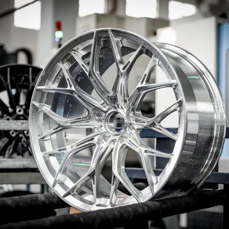 CNC machined concave forged wheel in raw aluminium before finishing at FLEXIFORGED