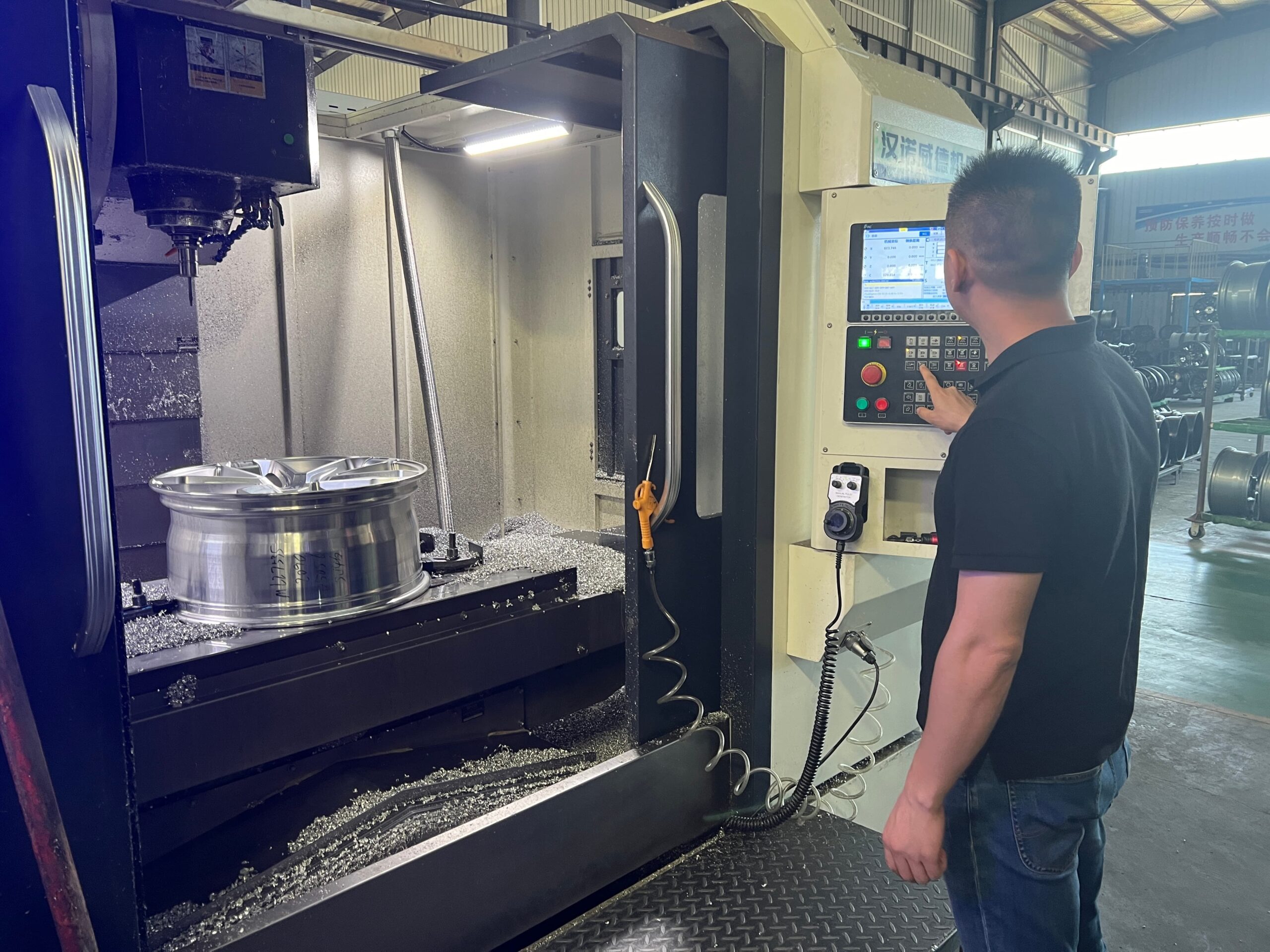 5-axis CNC machining a forged wheel face at FLEXIFORGED
