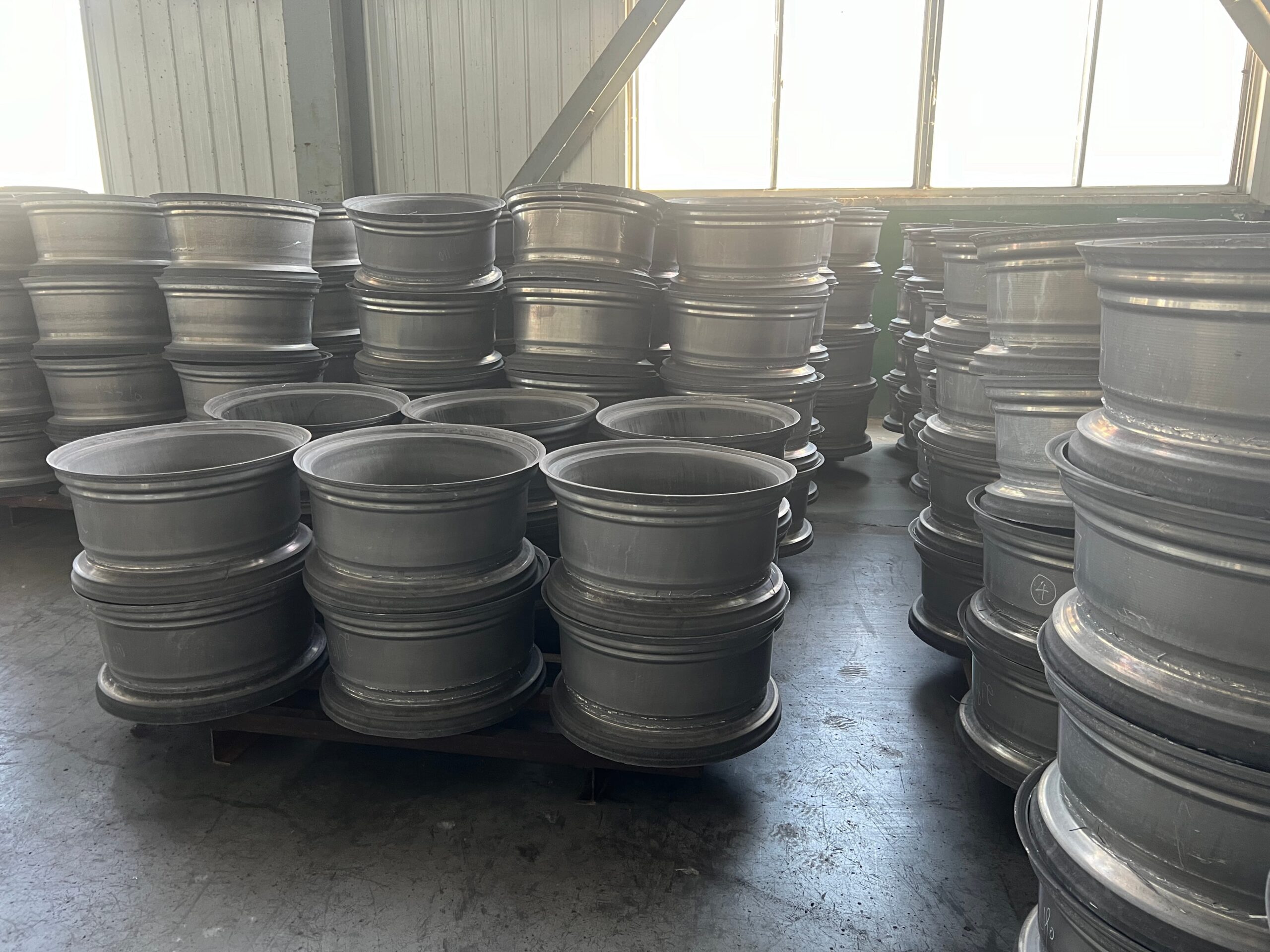 Forged wheel billet blank before CNC machining at FLEXIFORGED factory
