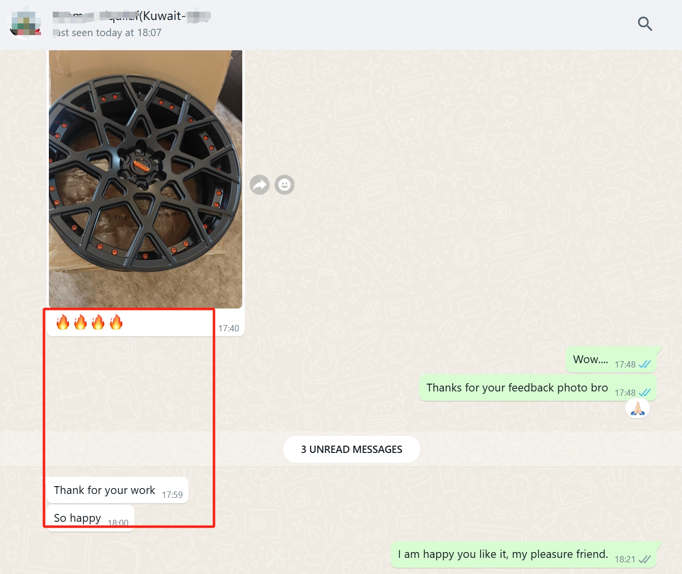 WhatsApp screenshot — matte black forged wheel with orange hardware unboxed in Kuwait