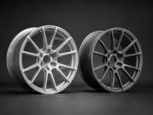 6061-T6 aluminum forged wheel and magnesium forged wheel shown side by side by FLEXIFORGED