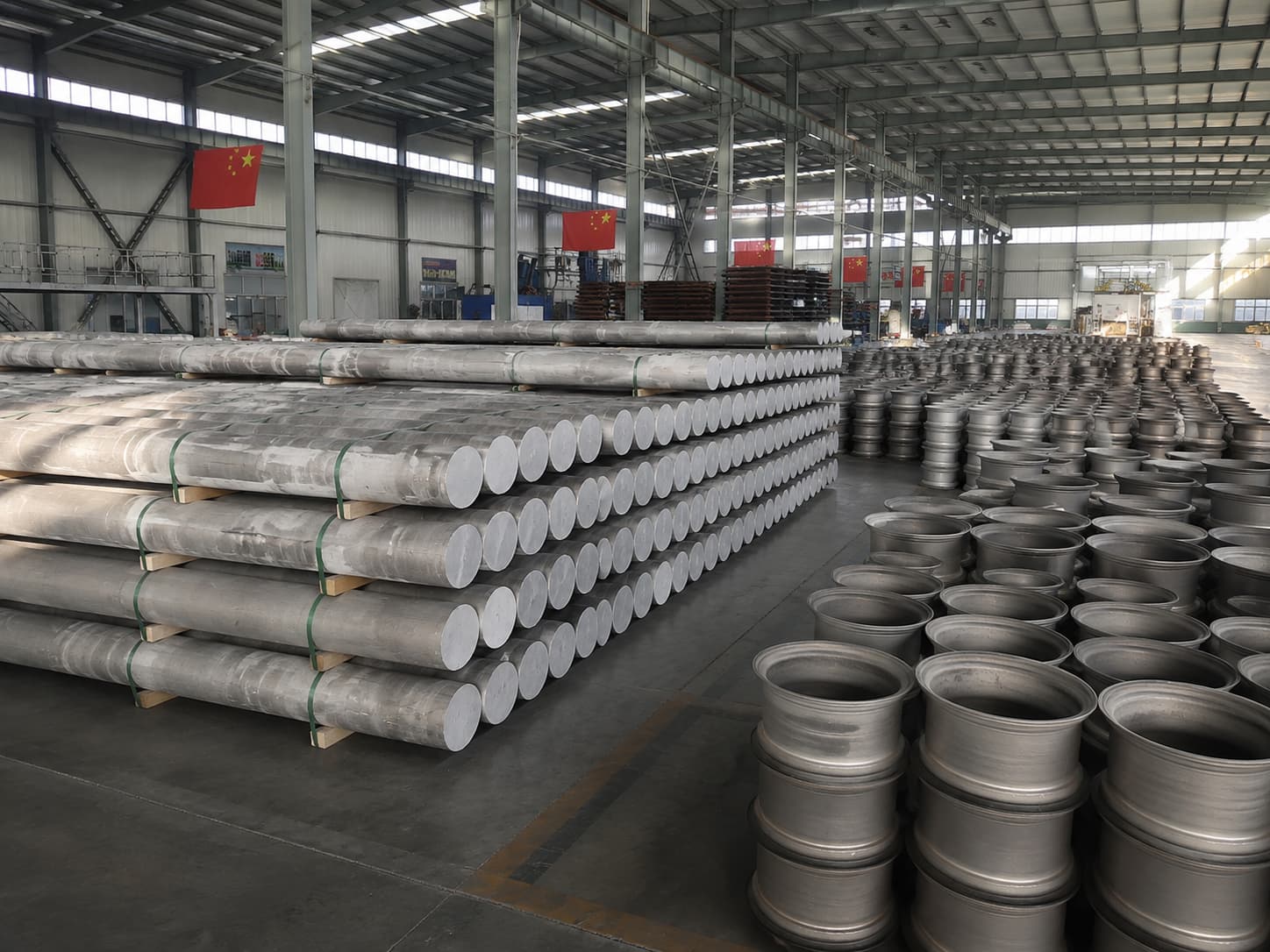 Aluminum billet being forged for FLEXIFORGED forged wheels on the press line in Chongqing