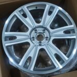 21x9 silver with machined face forged wheel front view哎