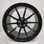 Gloss Black surface texture detail on forged aluminium wheel