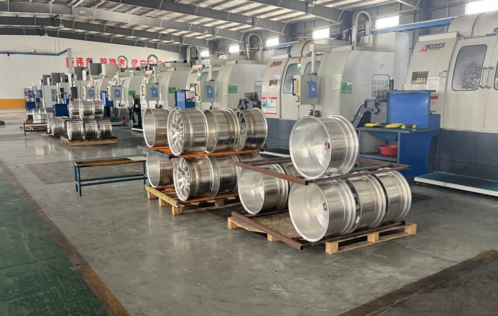 FLEXIFORGED magnesium forged wheel workshop with CNC machines and semi-finished wheel blanks